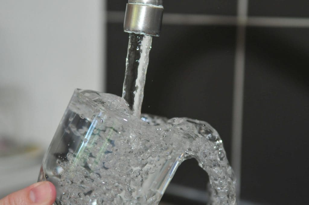 The Most Common Signs of Hard Water drinking more water